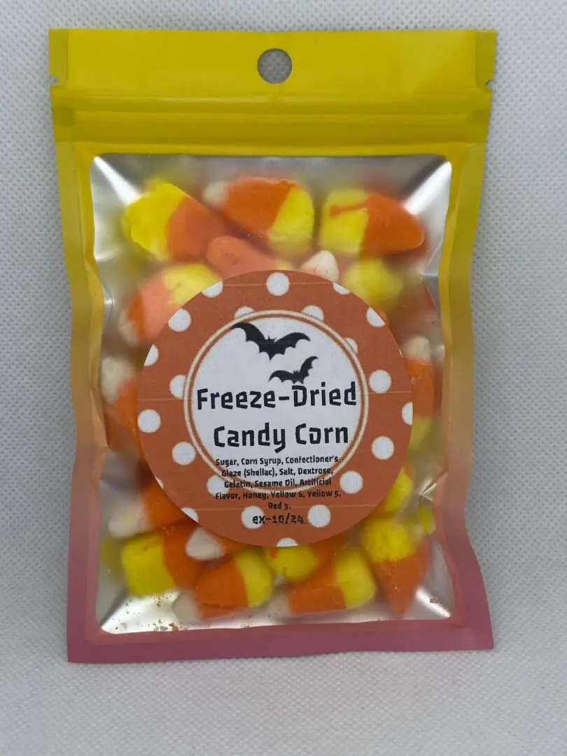 A bag of candy corn with a label on it.