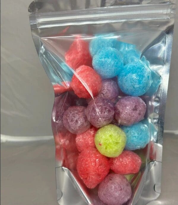 A bag of candy is shown with different colors.